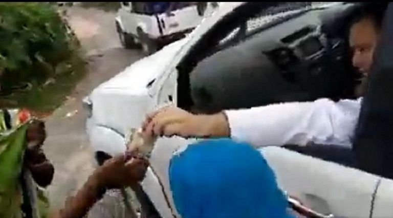 Video Shows Tejashwi Yadav Distributing Money to Villagers Ahead of Polls. Watch